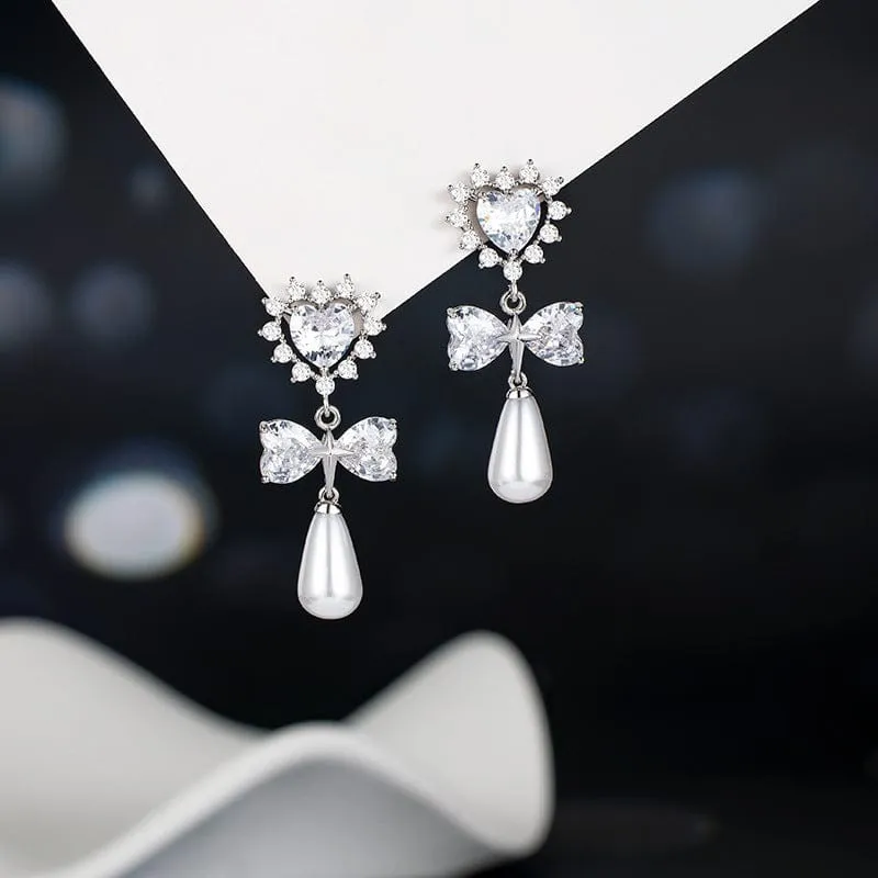 Fashionable Bowknot Heart Dangle Earrings