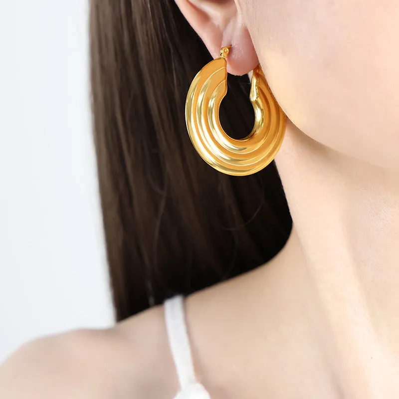 Fashionable Titanium and Gold-Plated Circular Earrings for Women