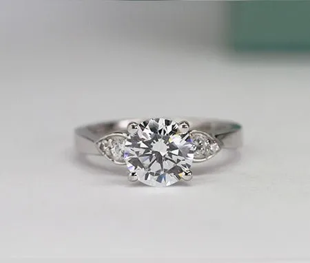 Hibiscus - Round Moissanite Engagement Ring